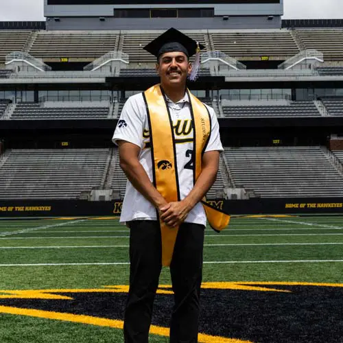 Student in field posing