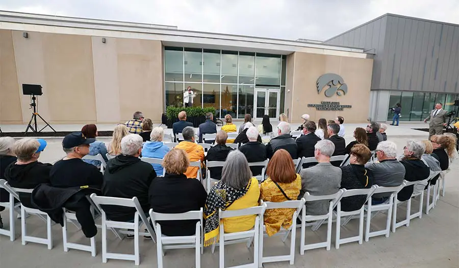 people seated listening to speaker